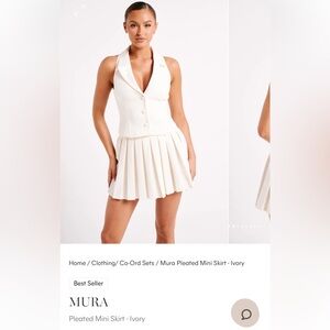 Brand new never worn ivory pleated mini skirt Meshki Mura. Small